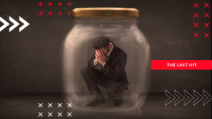 The image of a man dressed in a business suit stuck inside a glass jar with the lid on, the man looks sad and downcast